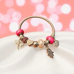 Silver & Hoy Pink Charm Bracelet. Dragonfly, pearl and sparkle beads.